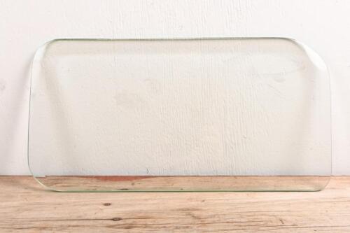 WIND DEFLECTOR: A vintage bevelled wind deflector on tempered glass