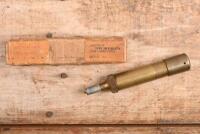 LUBRICATING GUN: A circa 1950s brass lubricating gun