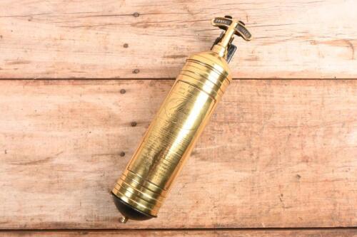 PYRENE FIRE EXTINGUISHER: A Pyrene brass fire extinguisher