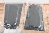 E -TYPE: A collection of Jaguar E-Type V12 new old stock items. Shift ID plate (2), brush for ID plate, two door recess panels, rubber bumper overriders, carburettor dampers, rear hinge escheons,'DEFROST' label bracket & others - 6