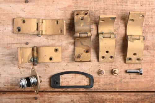 MG: A group of MG 'T' Series parts including door hinges, LUCAS dash light holder & three MG cast engine studs