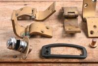 MG: A group of MG 'T' Series parts including door hinges, LUCAS dash light holder & three MG cast engine studs - 2