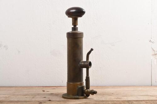 PUMP: A veteran era brass priming pump