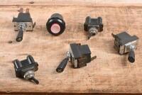 SWITCHES: An assorted group of switches suited to Alfa Romeo, including wiper, lights, fan and demister