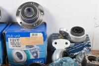 BMW: A box of BMW parts including two SKF hub units, belts, hoses, suspension parts, thermostat housing, bearing, pulleys and tools suited to&nbsp;E46 non M3 models.&nbsp; - 8