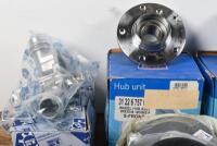 BMW: A box of BMW parts including two SKF hub units, belts, hoses, suspension parts, thermostat housing, bearing, pulleys and tools suited to&nbsp;E46 non M3 models.&nbsp; - 9