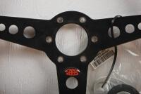 SAAS: A SAAS three spoked, red leather rimmed steering wheel - 2
