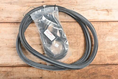 E-TYPE: A Jaguar Series III E-Type 'Martin Roby' new old stock rear rubber window seal. With rubber insert