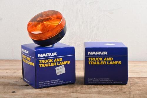 TAIL LIGHTS: A pair of new old stock NARVA amber rear direction lamps