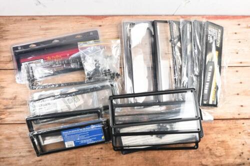 NUMBER PLATE FRAMES: One box of approximately mostly unused 20 number plate frame sets