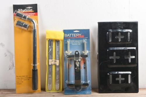 CAR ITEMS: Three car items. Battery holder, tyre levers & wrench