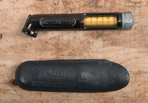 MOTOR METER: A vintage 'MOTOMETER' tyre gauge. With original leather pouch