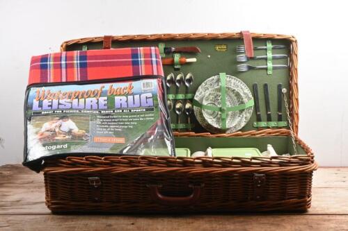 PICNIC SET: A complete and unused ceramic picnic set by brexton, sold by Henry Buck's, Melbourne. with wicker basket. With waterproof rug