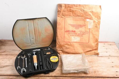 JAGUAR: A Jaguar MKII 240/340 original tool kit with mint condition tools. With original rare JAGUAR Tool Container envelope