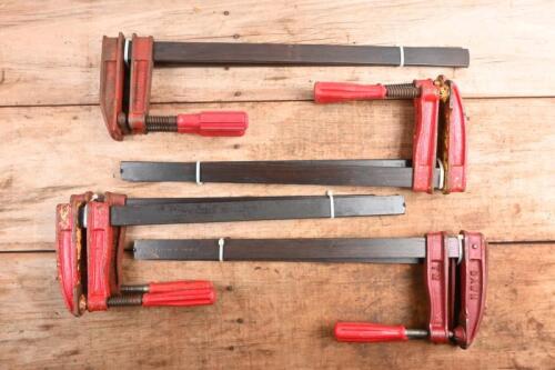 F CLAMPS: Four pairs of F clamps, manufactured by 'DAWN' and 'PAUL CALL'; each measures approximately 60 cm in length.