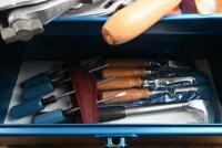 TOOL BOX: A metal tool box with multiple tools including saws, screw driver set, chisels, hammer - 4