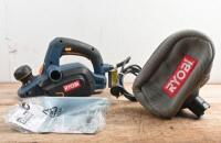 PLANER: A RYOBI ERP6582 planer, with instruction manual, dust bag & accessories