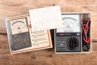 TOOL BOX: A metal tool box with a unused MICRONTA MULTITESTER & mint and boxed ARLEC UNIVERSAL BATTERY CHARGER - 2