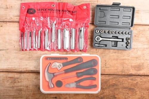 TOOL GROUP: An assorted tool group. 12 piece Hollow Punch Set, small Tool Kit & small Socket Set