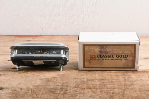 REAR TAIL LIGHT: A mint and boxed rear number plate light