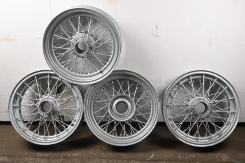 MG: Four MG TC 16" x 4" 48 spoke wheels
