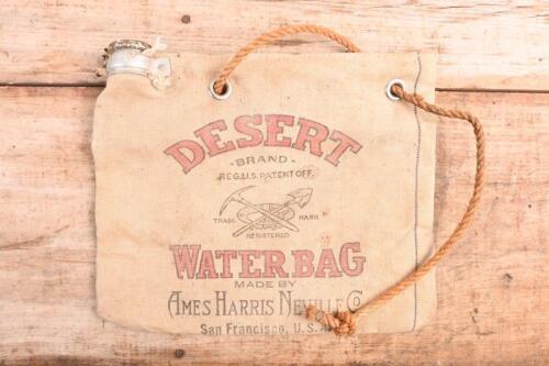 WATER COOLER BAG: A unused hessian water cooler bag by 'DESERT BRAND WATER BAG'. Made by Ames Harris Neville Co, San Francisco, U.S.A