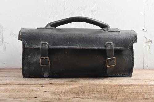 TOOL BAG: A veteran and vintage black solid leather tool bag