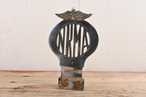 43B · NRMA: A early NRMA members grille badge by Angus & Coote