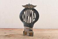 NRMA: A early NRMA members grille badge by Angus & Coote