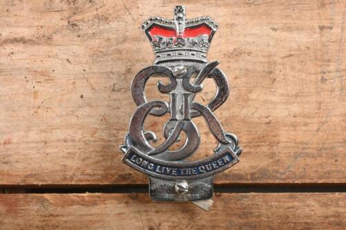 QUEEN: A 'Long Live the Queen' car grille badge by 'Streamlux souvenir', with mounting screws.