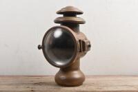 BRASS LAMP: A brass lamp with clear front lense. Stamped 'PAT.JUNE 8.'09' to side