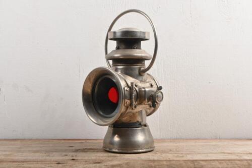 COACH LANTERN: A "Dreadnaught" nickel plated lantern. Red lense to side