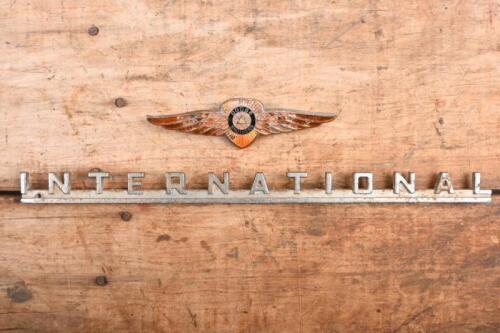 72A · AMERICAN CAR BADGES: Two American car badges. 'DODGE' & 'INTERNATIONAL' badges