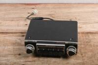 CAR RADIO: An original MOTOROLA (MODEL No. 114) push button AM/FM radio