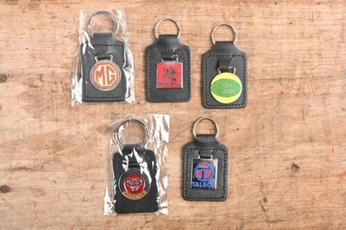 KEYRINGS: Five keyrings for British marques including 'BEDFORD', 'JAGUAR', 'LAND ROVER, 'MG', 'TALBOT'