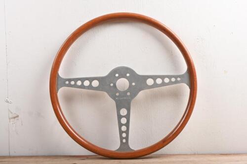 MOTO LITA: A circa 1950s-1960s wood rimmed Mota Lita steering wheel similar to that used on Jaguar E Type