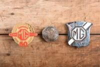 MG: Three MG car badges. MG CAR CLUB & MG CAR CLUB VICTORIA 50 (1958 - 2008) badge