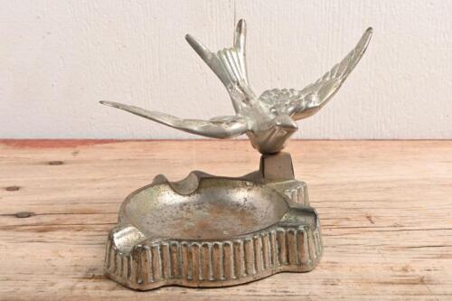 SWALLOW: A Standard Swallow cars showroom ashtray, later to become Jaguar. Original patina