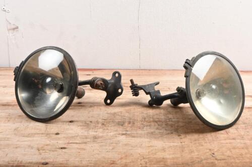 SPOTLIGHTS: A pair of circa 1920s - 1930s fully adjustable spotlights with mounting bracket