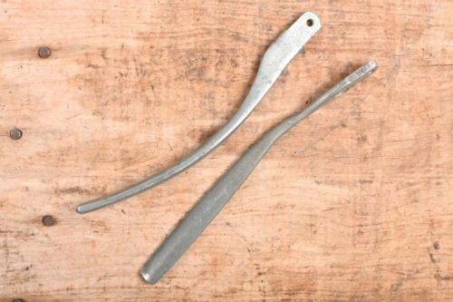 MERCEDES-BENZ: A Mercedes-Benz SL 107 convertible roof release handles set