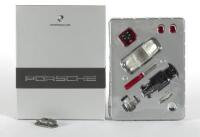 PORSCHE: A Porsche 356 roadster Schuco model kit, 1:43 scale with small 550 spyder desk ornament