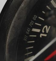 PORSCHE: A Porsche 911 VDO Kienzle clock (Part No. 911 641 701 00). Date stamped '1.70' - 3