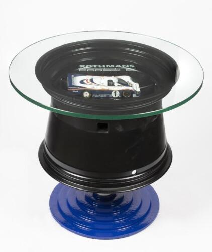 956/962: An decorative coffee table featuring an original race used&nbsp;17inch 956 Porsche wheel as used on the Rothmans 956 at the final round of the 1984 FIA World Endurance Championship being the 'Sandown 1000'