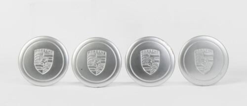 911 WHEEL CAPS: A set of four circa 1970s-1980s aluminium Porsche centre wheel caps