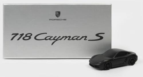 CAYMAN: A black pewter or metal Porsche 718 Cayman S model in 1:43 scale