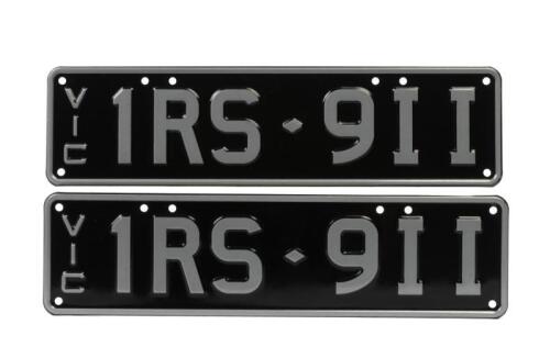 911: A set of silver and black slimline number plate '1RS - 9II'. With rights to display