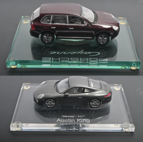 AUSTIN KING: Two 1:43 scale Paul's Model Art/MINICHAMPS&nbsp;models as presented for various events. Cayenne & 911 models presented to Austin King