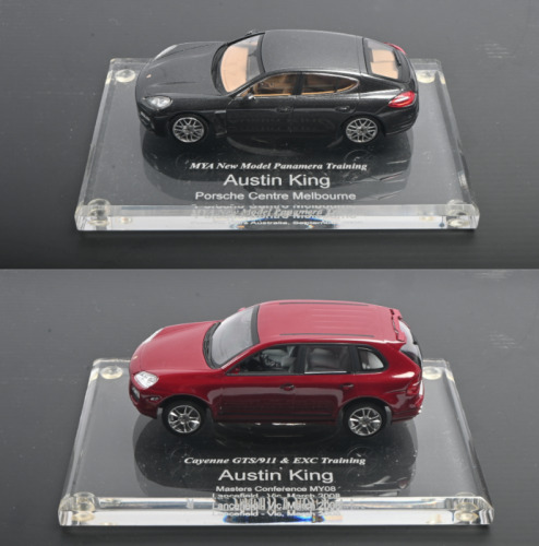 AUSTIN KING: Two 1:43 scale Paul's Model Art/MINICHAMPS&nbsp;models as presented for various events to Austin King. Porsche Cayenne GTS, Panamera models