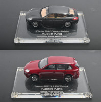 AUSTIN KING: Two 1:43 scale Paul's Model Art/MINICHAMPS&nbsp;models as presented for various events to Austin King. Porsche Cayenne GTS, Panamera models
