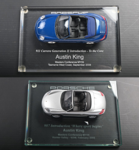 AUSTIN KING: Two 1:43 scale models as presented for various events to Austin King. 911 Carrera & 987 models